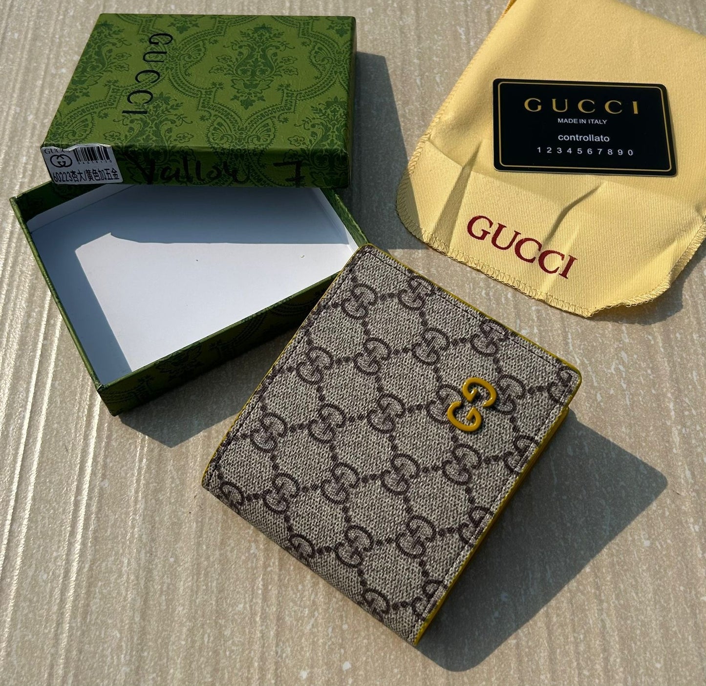 Gučci Monogram Wallets